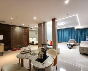 Xincheng Hotel - Beitun - Comedor