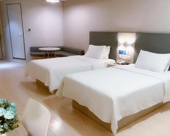 Hanting Hotel Zibo Gongqingtuan Road - Zibo - Bedroom