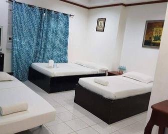 Island Inn - Boracay - Schlafzimmer