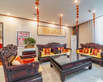 Youyoushang Hotel (Gongye Road Branch) - Jiaozuo - Living room
