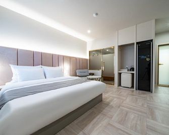 โรงแรมเดนบาสต้าพรีเมียมโรงแรมบูมิล - ปูซาน - ห้องนอน