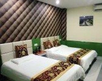 Shanghai Huijia Business Hotel - שנחאי - חדר שינה