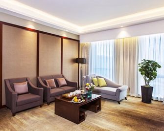 Peony Harbor City Hotel - Xiamen - Living room