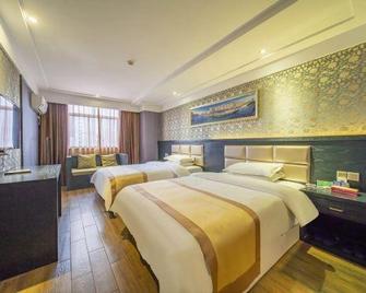 Dafuhao Hotel (Yichun Runda International Yuanzhou Gulou Square Branch) - Yichun - Bedroom