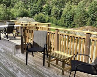 4 Person Holiday Home in Nosund - Nösund - Balkon