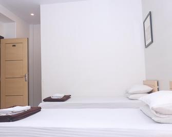 호텔 팁 톱 - 뭄바이 - 침실