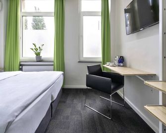 ديزاين هوتل ريجاند - هانوفر - غرفة نوم