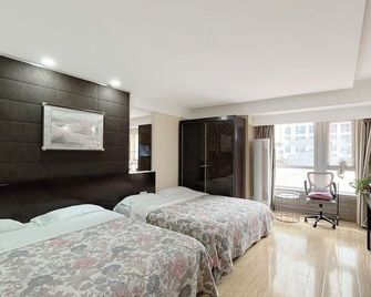 Kaibin Apartment Hotel (Nanjing Shengtian Mansion) - Nanjing - Bedroom