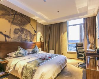 Dexin Henglong International Hotel - Yantai - Bedroom