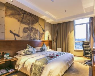 Dexin Henglong International Hotel - Yantai - Schlafzimmer