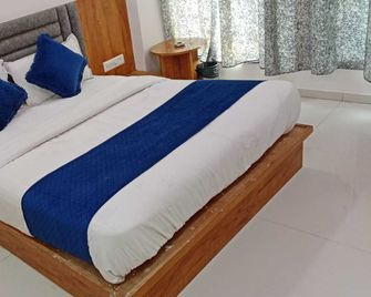 Hotel Vinayak - Ahmedabad - Habitación