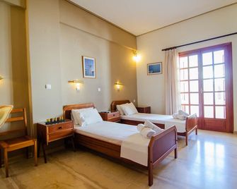 Almira Inn - Ios - חדר שינה