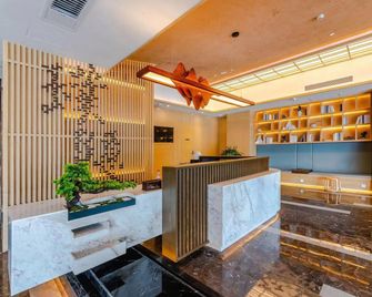 Jianguo Puyin Hotel (Qingdao Wusi Square Qingdao University Branch) - Qingdao - Recepción
