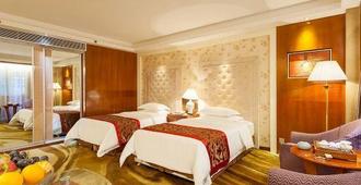Global Hotel - Quanzhou - Camera da letto
