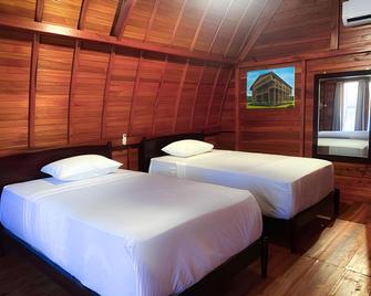 Hotel Pamordian Pangandaran - Pangandaran - Slaapkamer