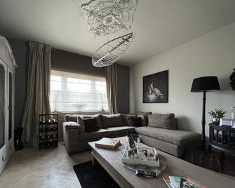 Bed & bokes aan de Maaskant - Lanaken - Wohnzimmer