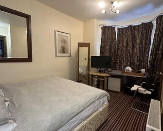 Aron Guest House - London - Schlafzimmer