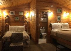 Earthsong Lodge - Healy - Schlafzimmer