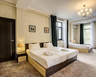Hotel Touristan Bishkek - Бішкек - Спальня
