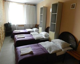 Hotel Chemodan - Pskov - Slaapkamer