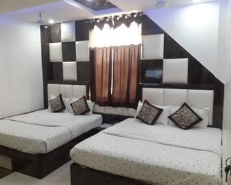 Hotel Jainson Residency - Agra - Slaapkamer