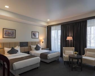 فندق Ambassador - بيشكيك - غرفة نوم