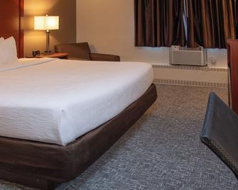 كواليتي إن ستاديوم أريا - غرين باي - غرفة نوم