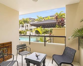 119 Santai Resort - Poolside Apartment by uHoliday - Casuarina - Balcony