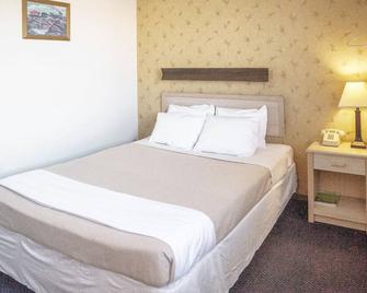 Economy Hotel Drayton - Drayton - Bedroom