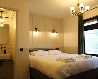 Mr.Lewis Hotel Rotterdam - Роттердам - Спальня