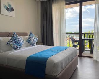 River Palm Hotel and Resort powered by Cocotel - Lingayen - Habitación