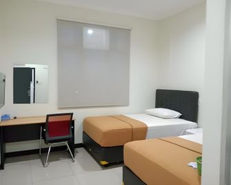 Hotel Aura - Lubuklinggau - Bedroom