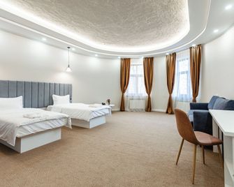 Aykun Hotel - 阿拉木圖 - 臥室