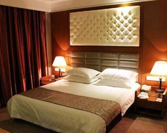 Nenjiang Hotel - Qiqihar - Habitación