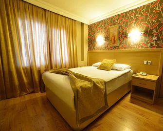 Royal Carine Hotel Ankara - Ankara - Sovrum