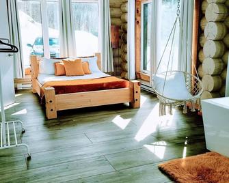Log cabin facing ski slopes, exceptional view, spa. - Saint-Côme - Bedroom