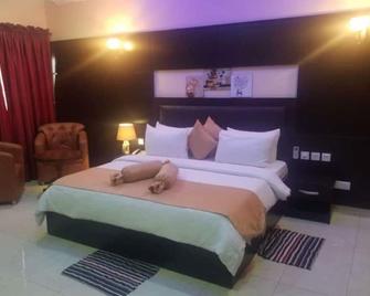 Witsspring Suites - Lagos - Schlafzimmer