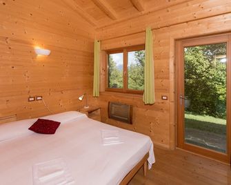 Retino Wood House - Wooden cottage with veranda - green energy - Gubbio - Bedroom