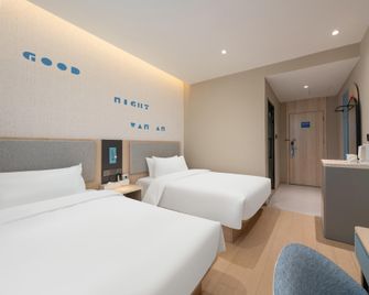 Home Inn - Dezhou Black Horse Wholesale Market Train Station Antique City Store - Dezhou - Bedroom