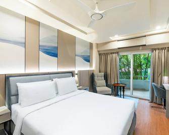 Pramod Convention & Beach Resorts - פורי - חדר שינה