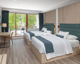 Harrison Beach Hotel - Harrison Hot Springs - Schlafzimmer