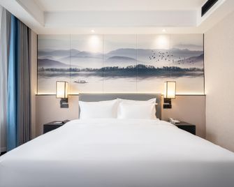 Rezen Hotel Suqian Economic Development Zone - Suqian - Bedroom