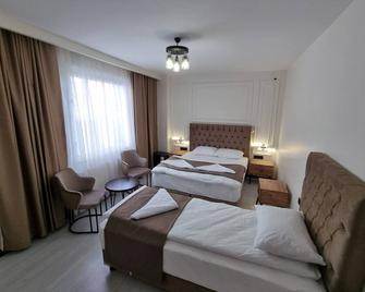 Elite Park Hotel & Suites - בייצ'קמג'ה - חדר שינה