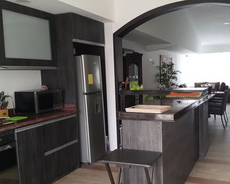 Hospedaje Solymar Sarie Bay - סן אנדרס - מטבח