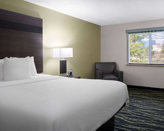 Baymont by Wyndham Liberty MO - Liberty - Schlafzimmer