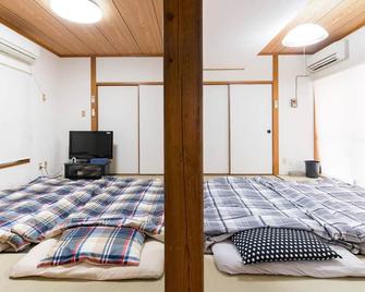 Naha Tomarin House - Naha - Makuuhuone