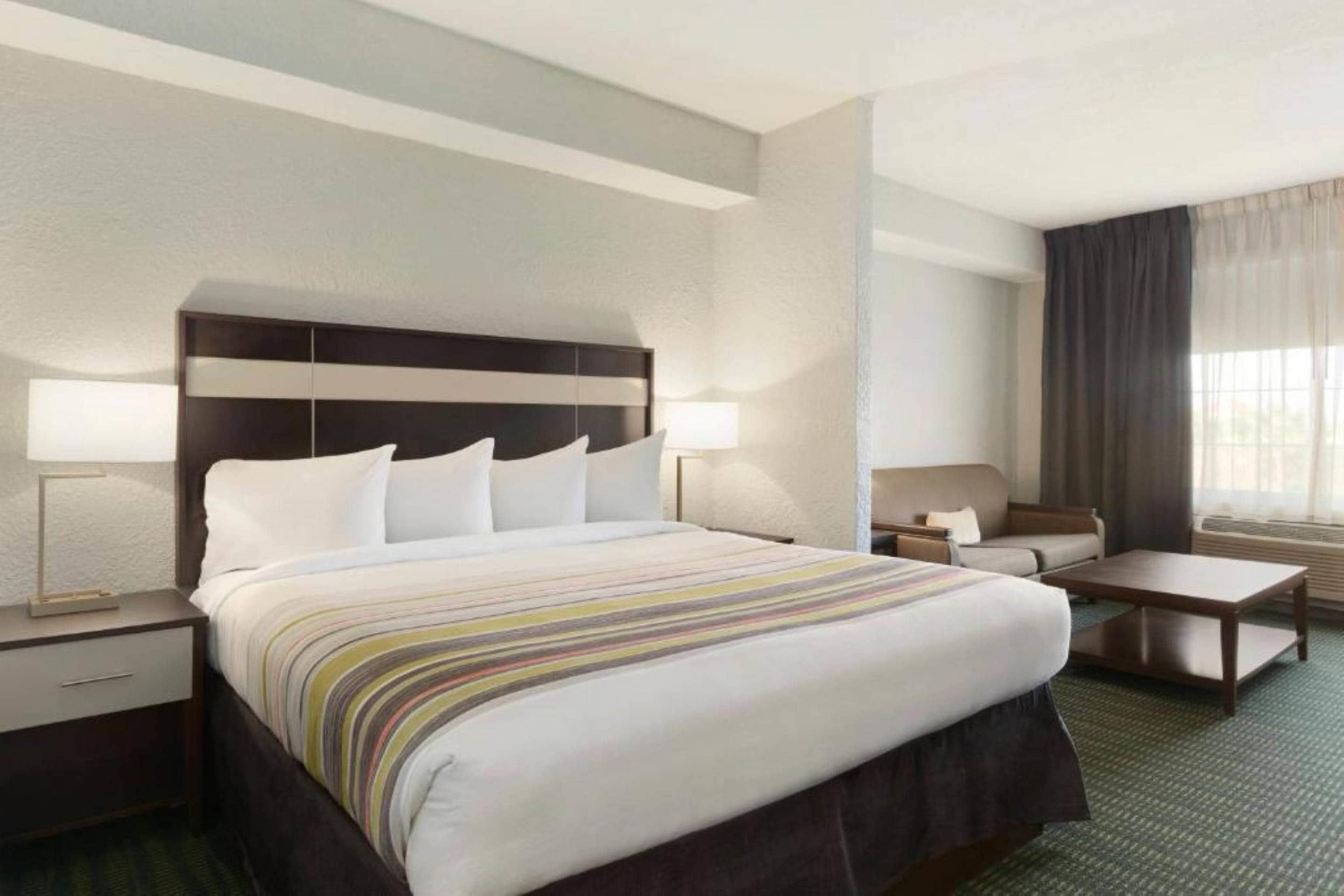 Hotel Flamingo Inn & Suites Vero Beach I-95 - וורו ביץ' - חדר שינה