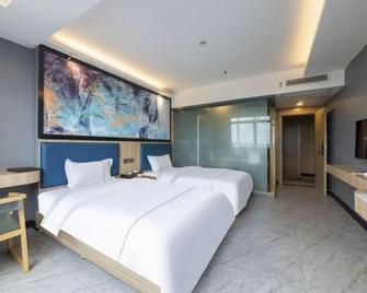 Hengfeng Business Hotel - Wuzhou - Bedroom