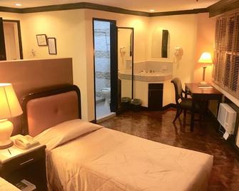 Lourdes Suites - Manila - Habitación