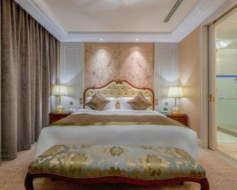 Huangshan Macrolink Legend Hotel - Huangshan - Schlafzimmer